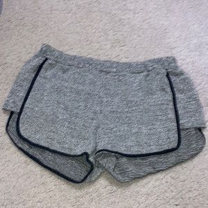 Selling these brandy Melville shorts in grey and black in the size small